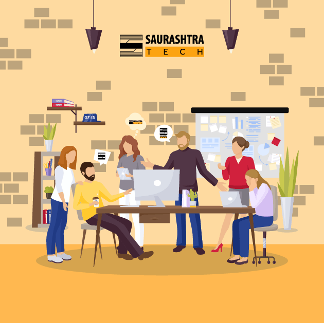 Team of Programmers and Designers Discussing about Saurashtra Tech on a Desk with Computers and Has a Logo of Saurashtra Tech on the wall